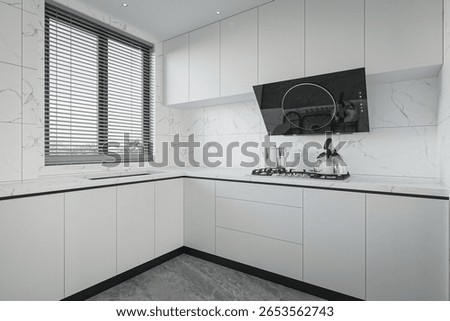 Minimalist White Kitchen-Marble Backsplash, Integrated Appliances, and Window Blinds