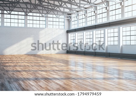 Minimalistic large hangar interior with empty brick wall and wooden floor. Industrial and exhibition concept. 3D Rendering