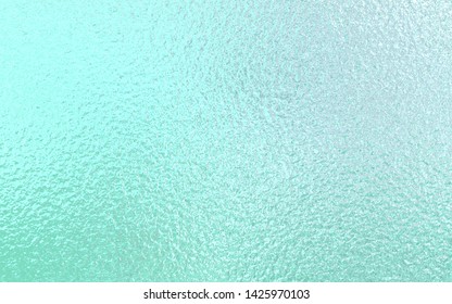 Mint Green Foil Paper Texture Background.