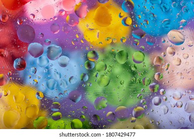 Mixing oil and water drops on a glass. Abstract macro colorful background. 3d render illustration