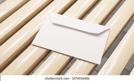 Mock up with an empty white envelope on a wooden background desk. Template for messages. 3D rendering.