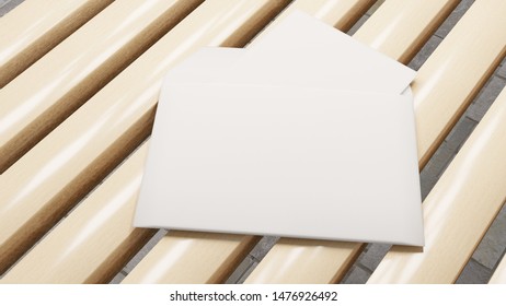 Mock up with an empty white envelope on a wooden background desk. Template for messages. 3D rendering.
