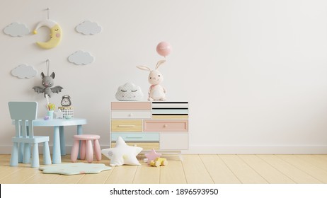 Mock up wall in the children's room with kid table set in light white color wall background,3d rendering