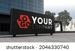 Mockup 3d logo facade sign standing in front of modern building 