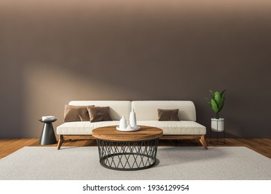 Mockup blank brown wall copy space above sofa in living room interior with parquet floor and grey carpet. Coffee table with dishes on a plate, plant in the pot, 3D rendering no people