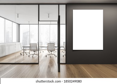 Mockup Blank Canvas On Dark Wall In Corridor Of Business Centre, Long Wooden Table With Black Chairs In Meeting Room. Light Wooden Design For Office Conference Room With No People, 3D Rendering