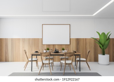 Mockup Canvas Frame In White And Wooden Dining Room With Wooden Chairs And Table, White Floor. Eating Room With Minimalist Furniture And Plant, 3D Rendering, No People