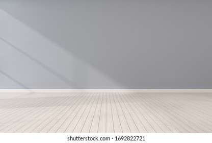 Mock-up of empty room and wood laminate floor with sun light cast the shadow on the wall,Perspective of minimal interior design. 3D rendering