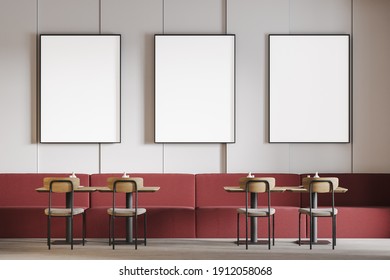 Mockup Frames Canvas Above Red Sofa In A Minimalist Cafe. Seats In Open Space Restaurant, Wooden Minimalist Furniture, 3D Rendering No People