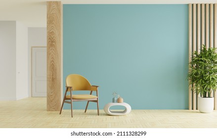 Mockup living room interior with armchair on empty blue color wall background.3D rendering
