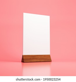 Mockup Sheet Of Paper On A Wooden Stand. Mockup White Stationery Stands On A Stand On A Pink Background. Mockup Menu On Stand On Pink Background .3D Concept. 3D Illustration