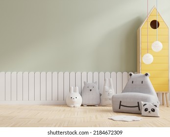 Mockup Wall In The Children's Room With Gray Sofa On Light Green Color Wall.3D Rendering