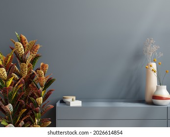 Mockup Wall With Plant,dark Blue Wall And Shelf.3D Rendering