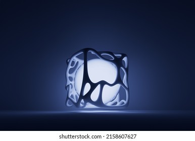 A modern abstract distorted cube cage frame surrounding a glowing sphere of light in a dark room.