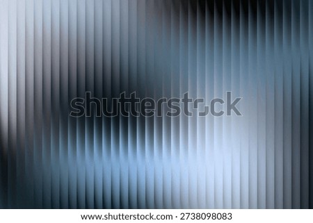 Modern abstract gradient background blending blue, gray, and dark tones with soft vertical striped texture and smooth glowing transitions. Layered digital lighting creates depth and a sleek futuristic atmosphere suitable for posters, branding visuals, website banners, presentations, and creative projects requiring a clean and contemporary abstract background composition.