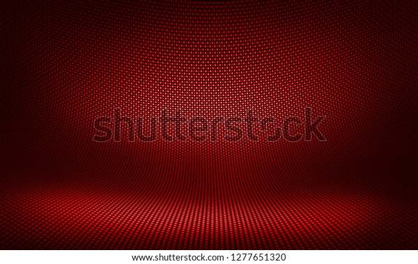 Modern\
background with distorted red carbon fiber smooth on surface under\
angle. Textured interior studio with\
light.