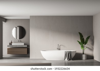 Modern bathroom interior with sink and white bathtub in eco minimalist style. No people. 3D Rendering Mock up