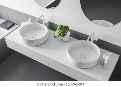 Modern Bathroom Interior With White Walls And A Double Sink On A White Mirror Shelf Above Them. Close Up. 3d Rendering.