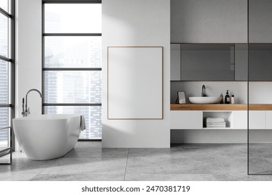 A modern bathroom with a large framed poster on a wall. Minimalist design with a bathtub and a vanity unit. Light background. Mockup concept.  3D Rendering
