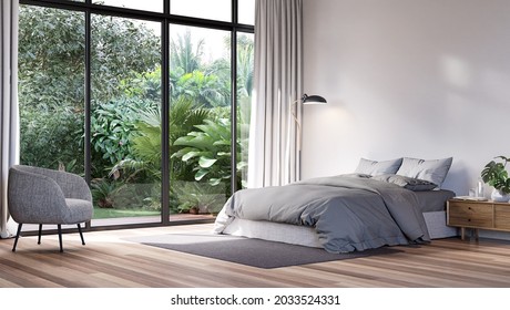 Modern bedroom with tropical style garden view 3d render,The Rooms have wooden floors ,decorate with gray fabric bed,There are large sliding doors, Overlooks wooden terrace and green garden. - Powered by Shutterstock - Get 15% off with code: PIKWIZARD15