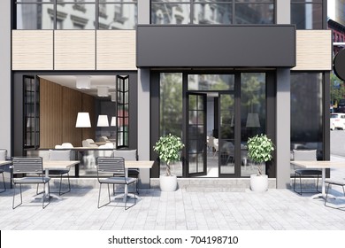 Modern black and gray cafe interior with a rectangular sign, wooden tables and metal chairs. 3d rendering mock up