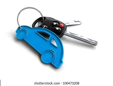Modern car keys with blue car key ring isolated on white. Concept for owning or buying a new or pre-owned second hand car or car rentals, leasing a car or insuring your car.