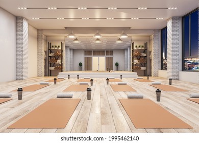 Modern concrete yoga gym interior with equipment, night city view and wooden flooring. Healthy lifestyle concept. 3D Rendering - Powered by Shutterstock