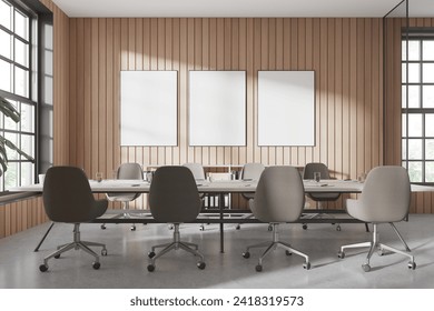 Modern conference interior with chairs and table, light concrete floor. Meeting space with stylish furniture and panoramic window. Three mockup copy space canvas posters in row. 3D rendering - Powered by Shutterstock