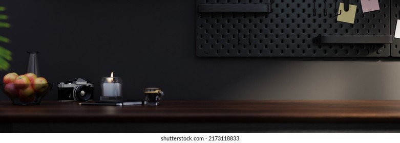 Modern Dark And Black Home Working Studio Design With Accessories And Copy Space On Dark Wood Tabletop Against The Black Wall With Pegboard. 3d Rendering, 3d Illustration