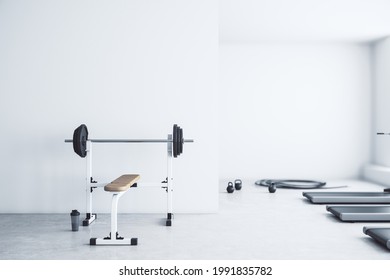 Modern Gym Interior With Empty Mockup Place, Equipment And Daylight. Mock Up, 3D Rendering