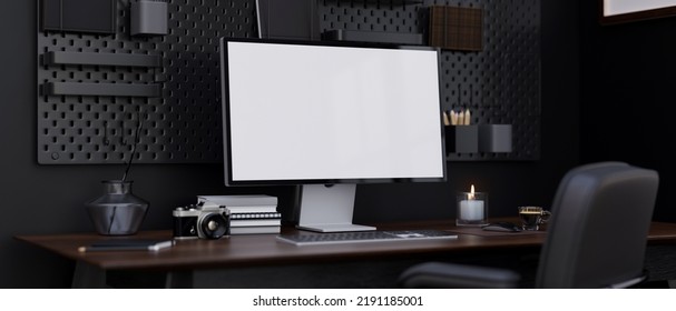 Modern Hipster Dark Office Workspace With Modern Pc Desktop Computer Mockup And Accessories On The Table, Black Pegboard On Black Wall And Office Chair. 3d Rendering, 3d Illustration