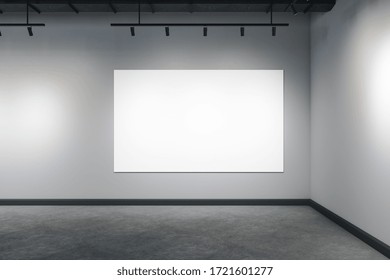 Modern interior with ceiling lamp and empty banner on gray concrete wall. Museum and exhibition concept. Mock up, 3D Rendering