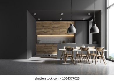 Modern kitchen interior with gray and white brick walls, a concrete floor and gray and wooden countertops. A long table with chairs near it. A mock up wall. 3d rendering