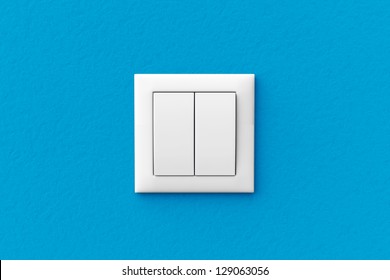 Modern Light Switch On A Blue Wall