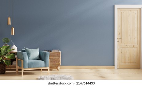 Modern living room has an armchair on empty dark blue wall background.3D rendering