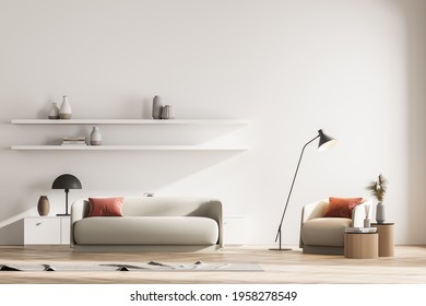 Modern Living Room Interior With An Armchair, Sofa And Commode, Lamp. Bookshelfs With Vase On White Wall. Reading And Relax Concept. No People. 3d Rendering.