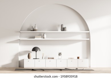 Modern living room interior with bookshelf niche arch, commode, lamp. Home concept. No people. 3d rendering.