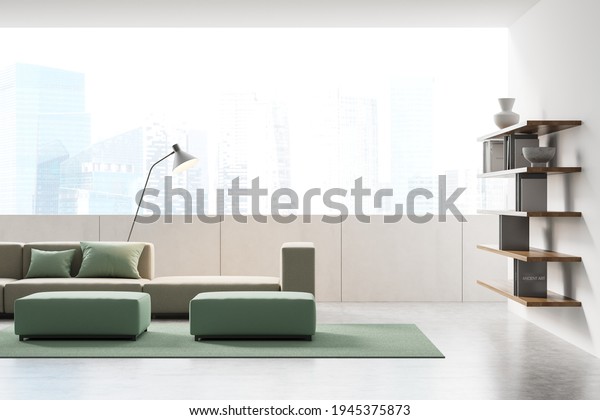 Modern living room interior with panoramic view\
on Singapore city center, beige comfortable sofa, bookshelf and\
green footstool, concrete floor. Concept of contemporary design.\
Mock up. 3d\
rendering