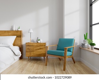 Modern mid Century and vintage interior of bedroom ,blue lounge chair with wood  bedside table and white bed  on white wall and wood floor in front of a window ,empty room ,3d rendering