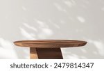 Modern, minimal round wooden pedestal table podium in dapple sunlight, shadow on white wall for luxury organic cosmetic, skincare, body care, beauty product background 3D