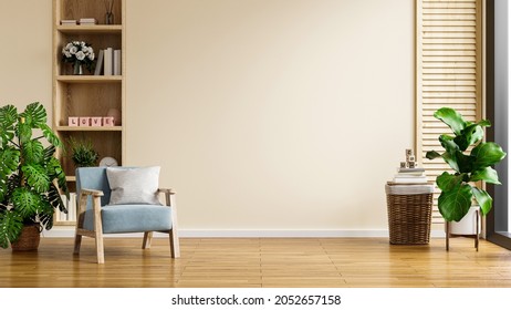 Modern minimalist interior with an armchair on empty cream color wall background.3D rendering
