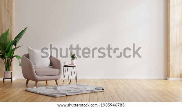Modern minimalist interior with\
an armchair on empty white wall background.3D\
rendering