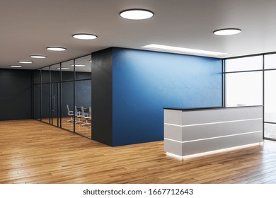 Modern Office Hall With Reception Desk And Copy Space On Blue Wall. Workplace And Lifestyle Concept. 3D Rendering