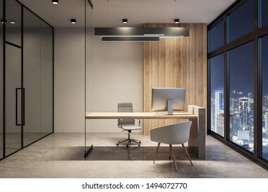 Modern Office Interior With Equipment And Night City View. Workplace Concept. 3D Rendering 