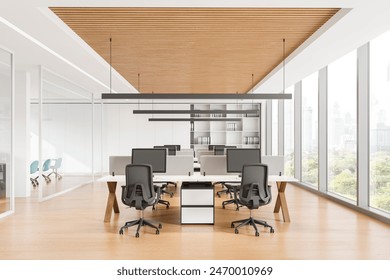 Modern office interior with workstations and computers, bright lighting, wood and white finish. Concept of workspace.  3D Rendering