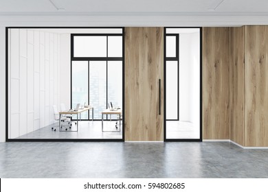 Modern Office Lobby Interior With A Conference Room With Glass Walls. There Is A Wooden Door And A Wall Fragment. 3d Rendering, Mock Up