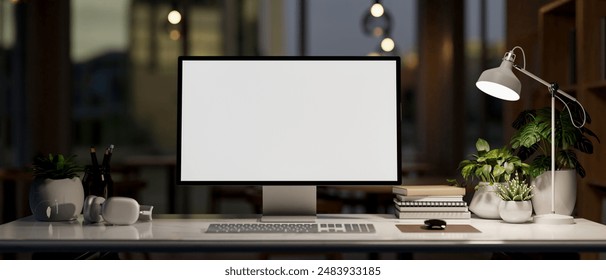 A modern office at night features a computer with a white-screen mockup, accessories, and a dim light from a table lamp. nighttime workspace concept. 3d render, 3d illustration