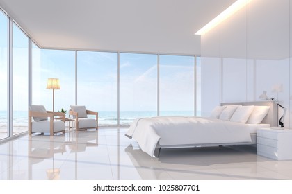 Modern white bedroom with sea view 3d rendering image.There are white tile floor and white glossy wall.Furnished with white furniture.There are large window overlooks to sea view.