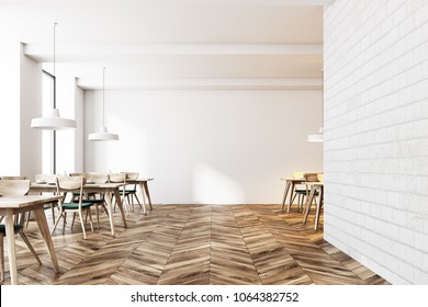 Modern white brick cafe interior with a wooden floor and tables with green chairs standing near them. Large windows and a blank wall. 3d rendering mock up
