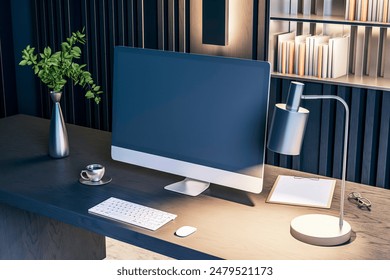 A modern workspace with a blank computer screen, desk accessories, plant, and a lamp against a wooden background, concept of a creative interior design. 3D Rendering